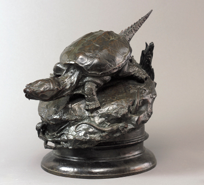 Statue of a turtle on a rock