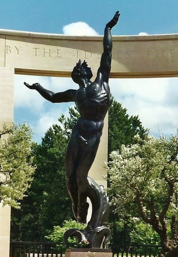 Statue of youth rising from the waves